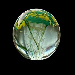 Vintage glass paperweight features an elegant yellow and green 3"